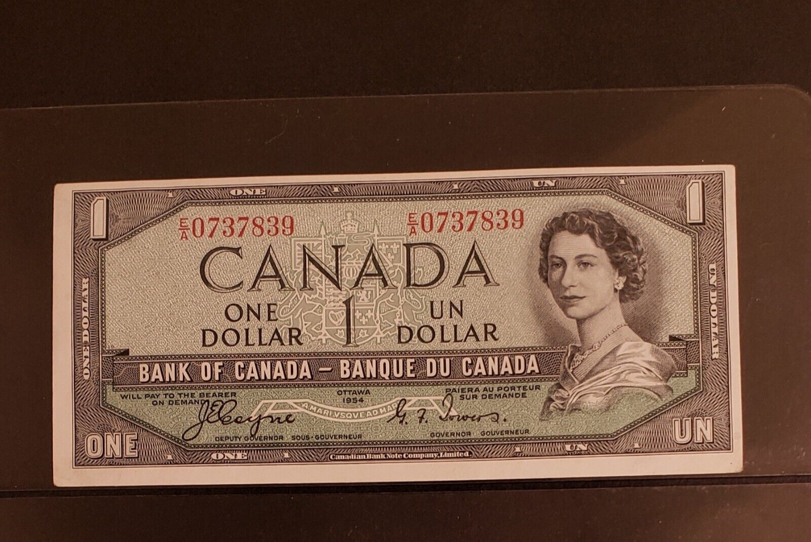 1954 Bank of Canada $1 Banknote. DEVIL FACE Banknote. High Grade Banknote.